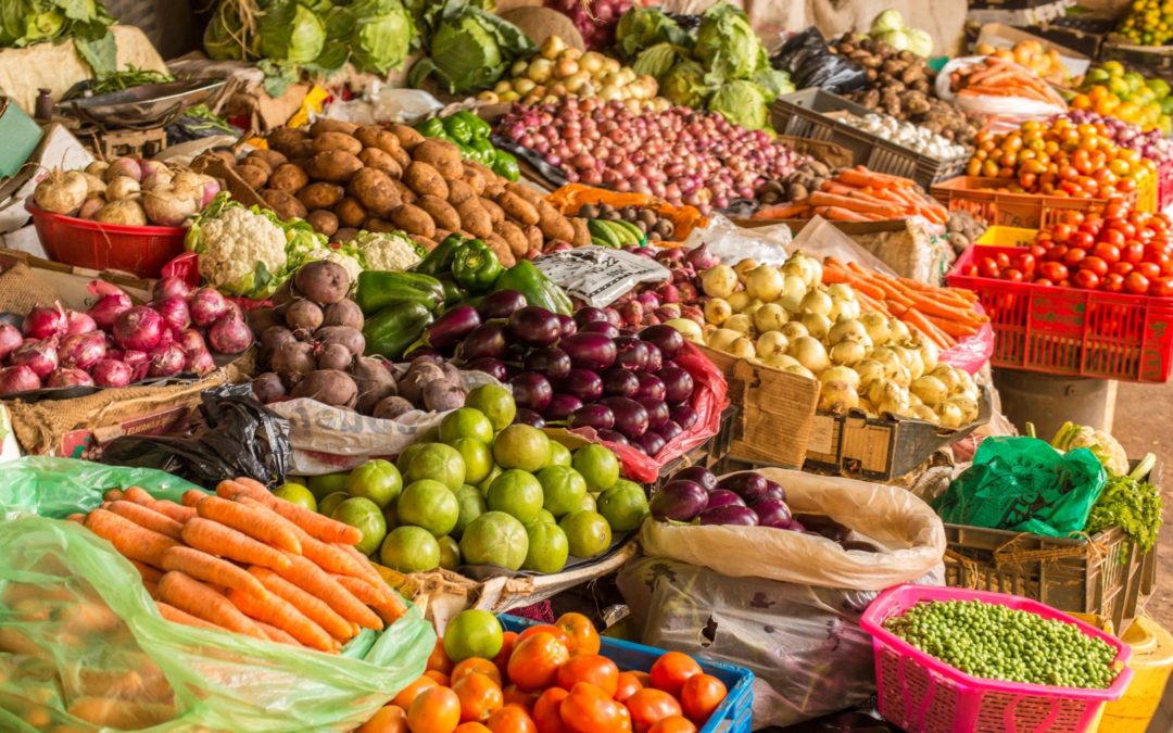 Colorful fresh vegetables and fruits market display